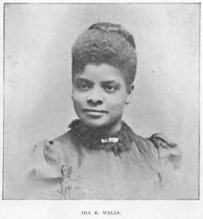 Formal portrait photo of a Victorian black woman with hair pinned up and high necked formal dress.