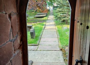 Garry Critchley/ The swing gate from the South Door.