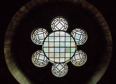 A rose window from inside the roof space
