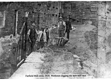 farfield workers digging out the race.jpg