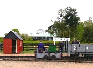 Solar-charged demonstration freight train, and signal hut