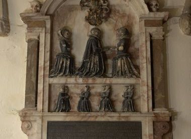 An alabaster wall monument of Richard Nailour, his two wives and his many children in 1616