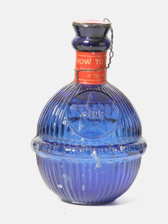 Blue glass globe shaped bottle.